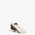 White and black Fendi Flow trainers with yellow accents, side logo strap