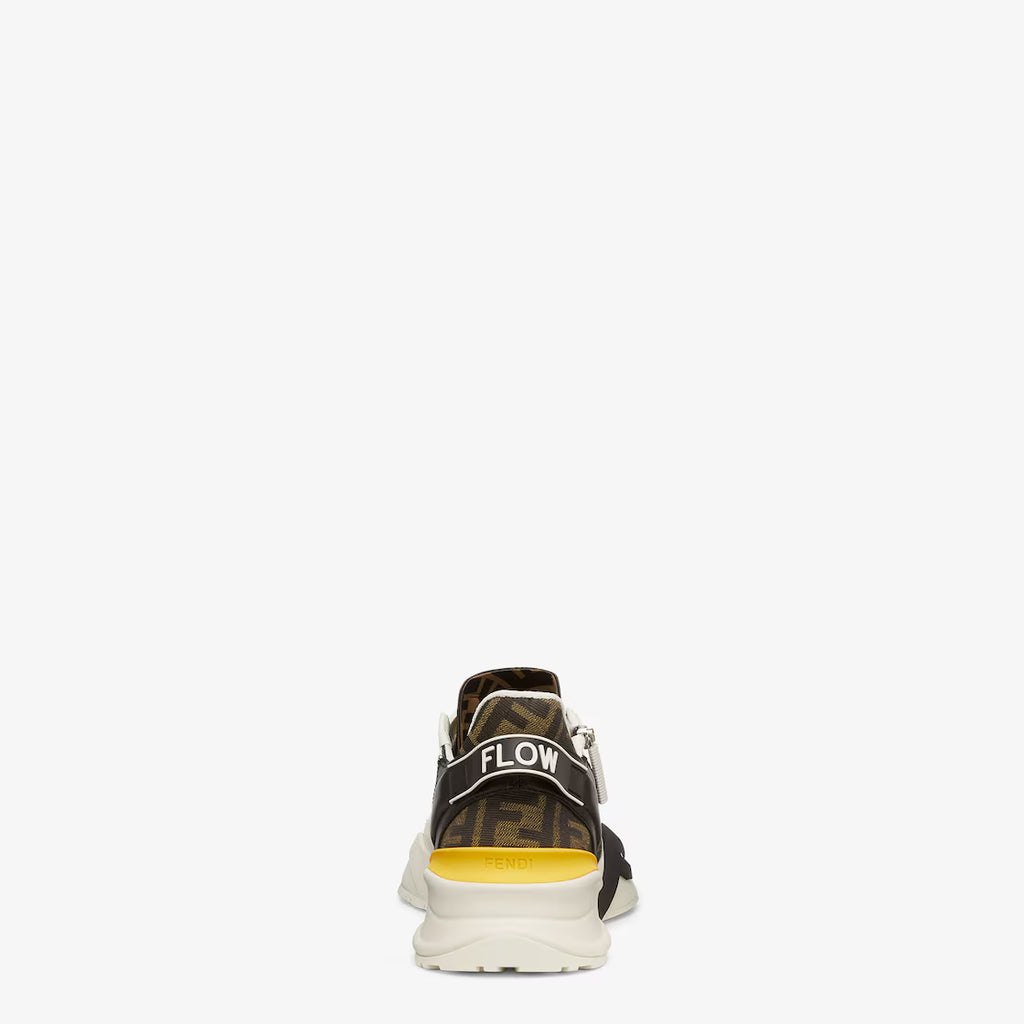 Back view of white and black Fendi Flow trainers with FLOW label on heel