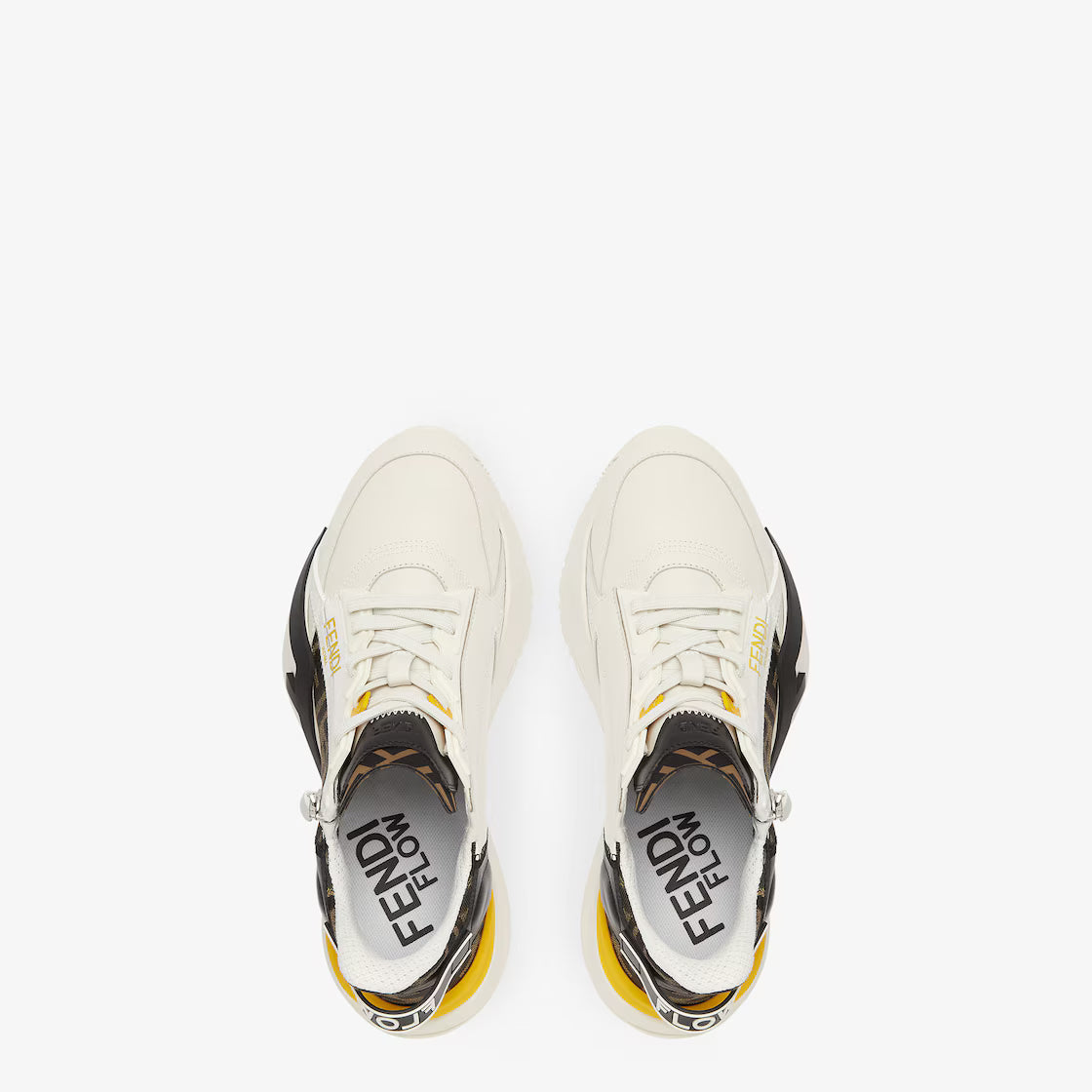 Pair of white Fendi Flow trainers from above, black logo lining, yellow accents