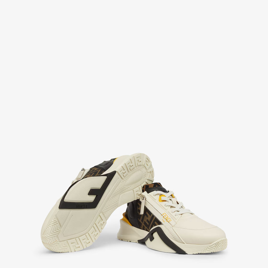 White and black Fendi Flow trainers, side profile with chunky sole and logo panel