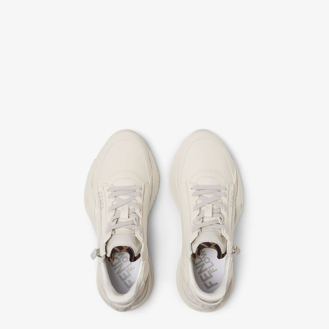 Pair of Fendi off-white lace-up sneakers, top view showing tongues and laces