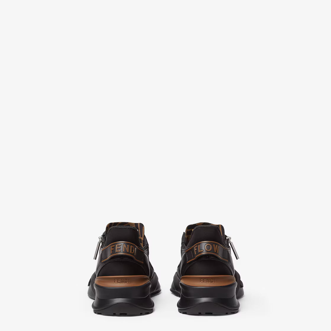 Black sneakers with rear branding, zip pull tabs, and orange heel trim