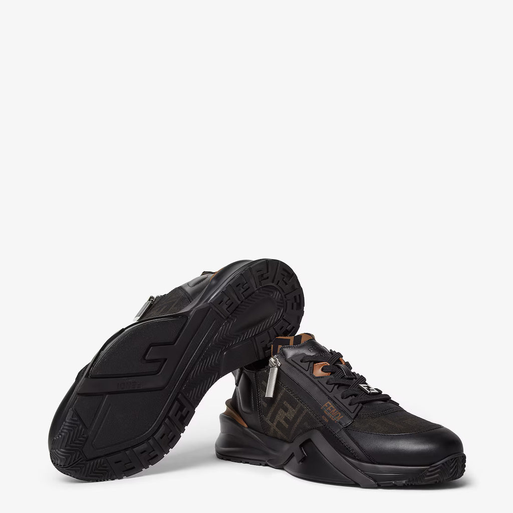 Black low-top sneakers with tread sole, FF pattern upper, and orange trim