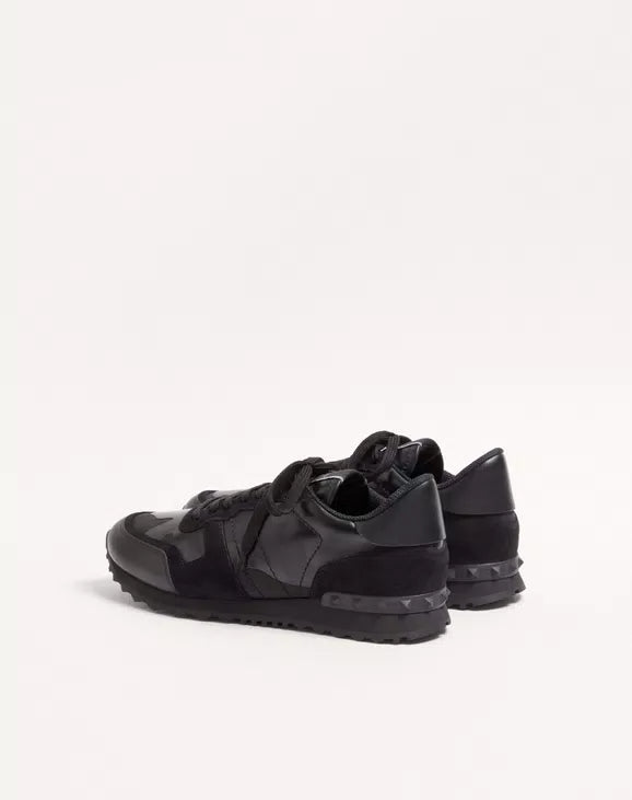 Black camouflage Rockrunner sneaker, lace-up with heel tab and ridged sole.