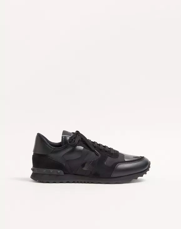 Black camouflage Rockrunner sneaker, lace-up design and chunky tread sole.