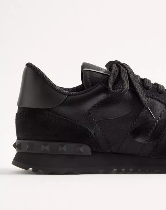 Black camouflage Rockrunner sneaker, textured side panel and studded midsole.