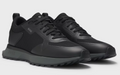Mixed-material trainers with mesh details and branding