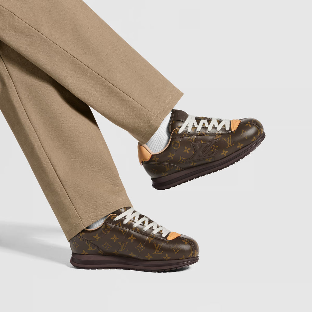 LV Buttersoft sneakers worn with beige pants, brown monogram, white laces, chunky sole