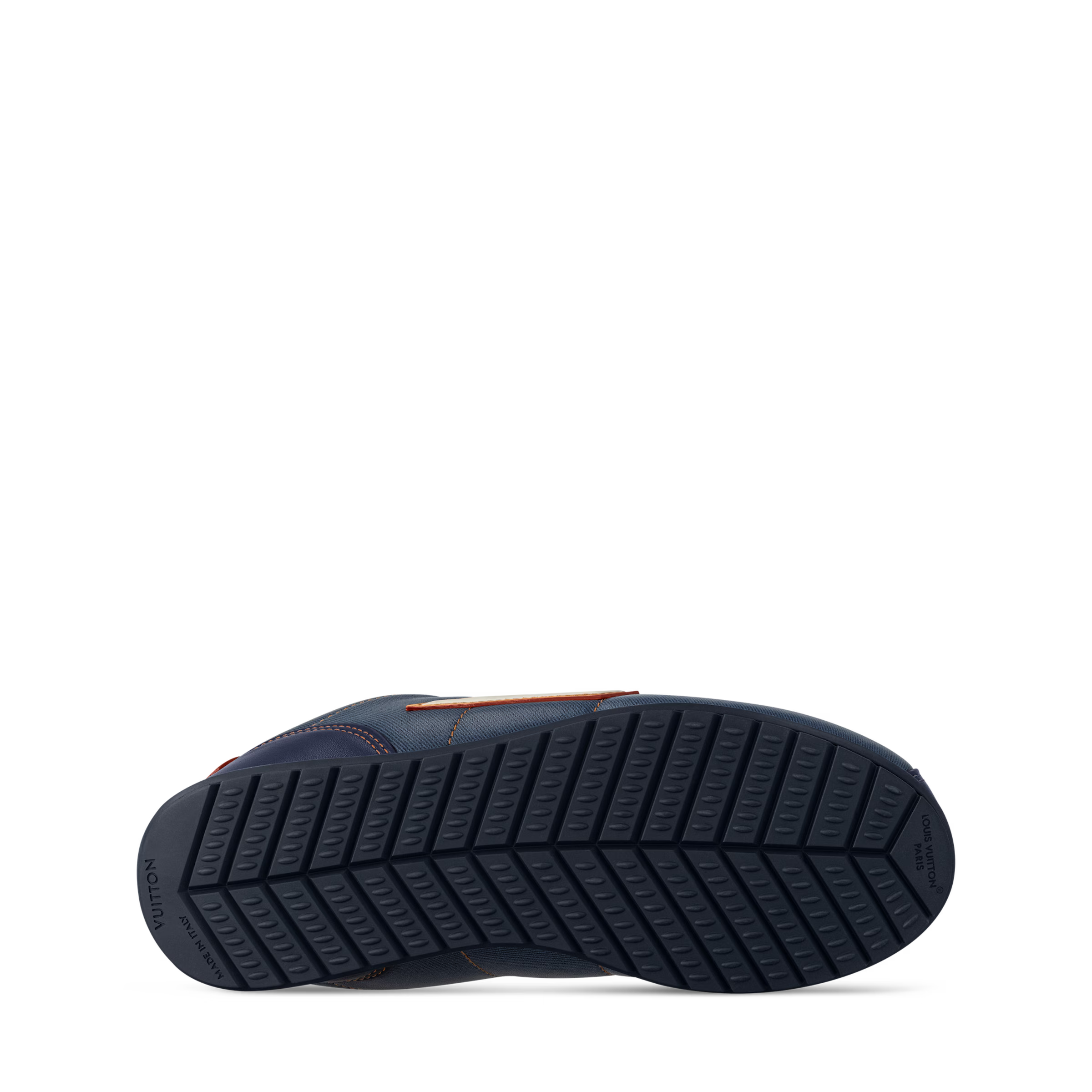 LV Buttersoft sneaker outsole with deep tread pattern, dark navy rubber base