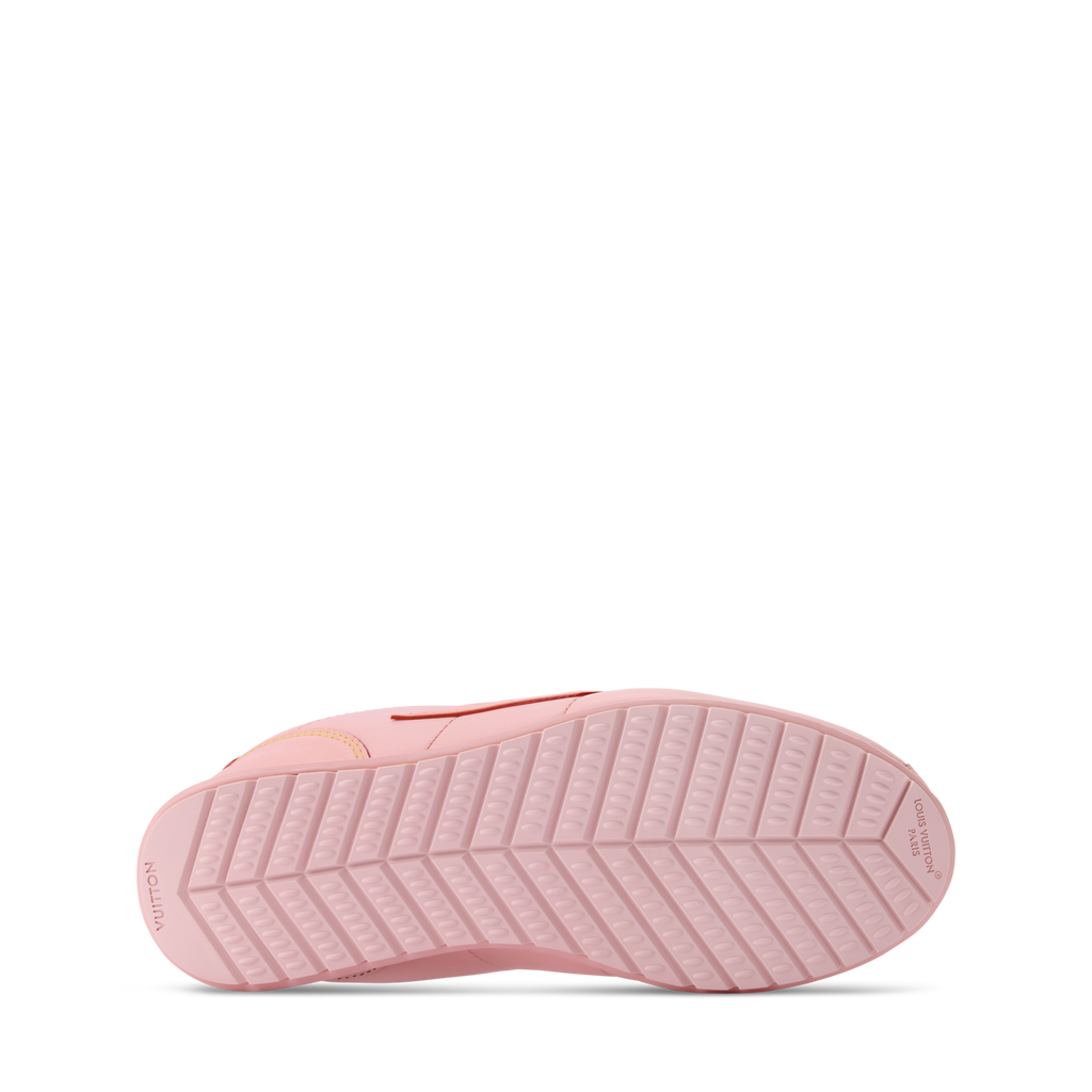 Pink sneaker outsole with textured tread and low-profile rubber platform sole