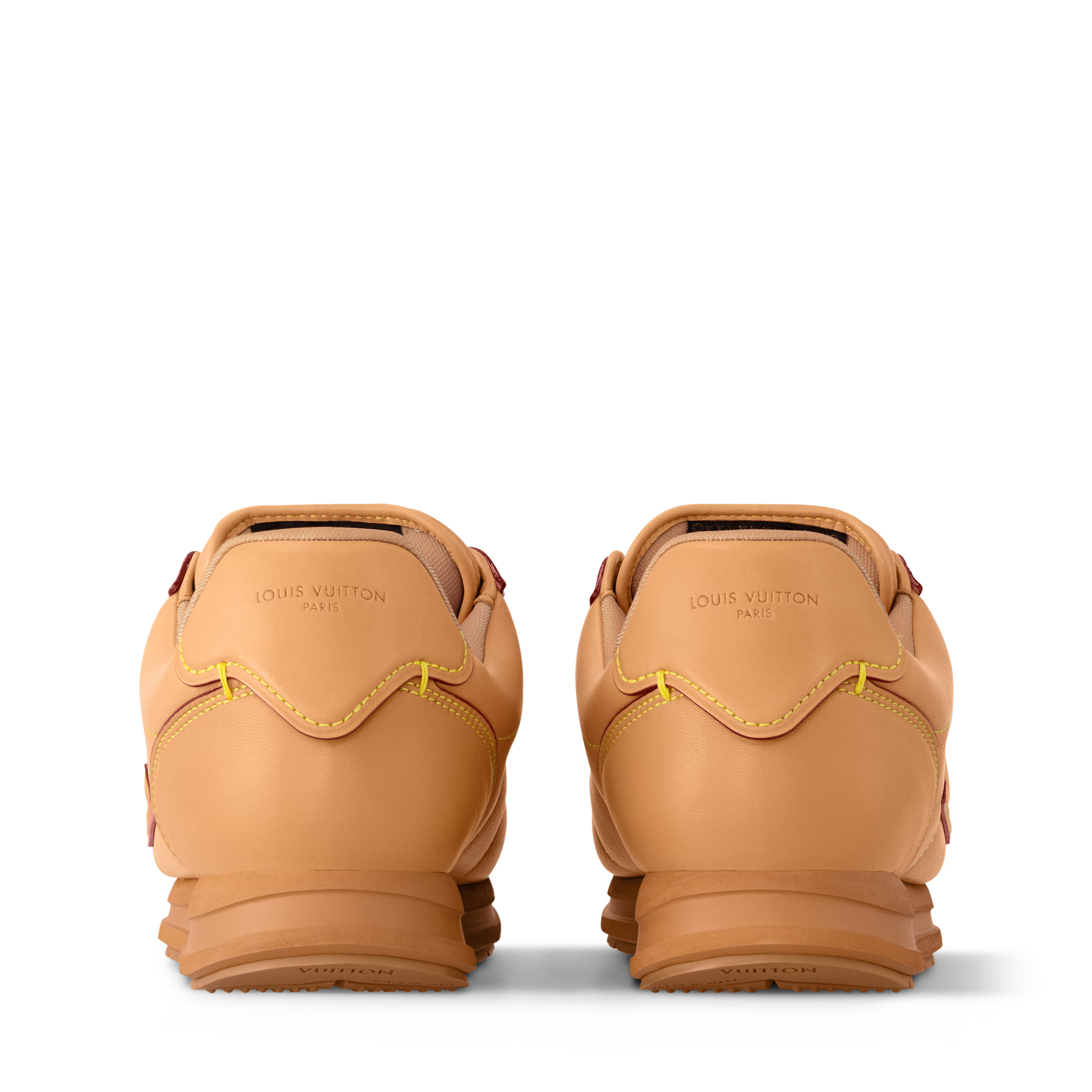 Tan sneaker heel view with Louis Vuitton branding and padded back tabs