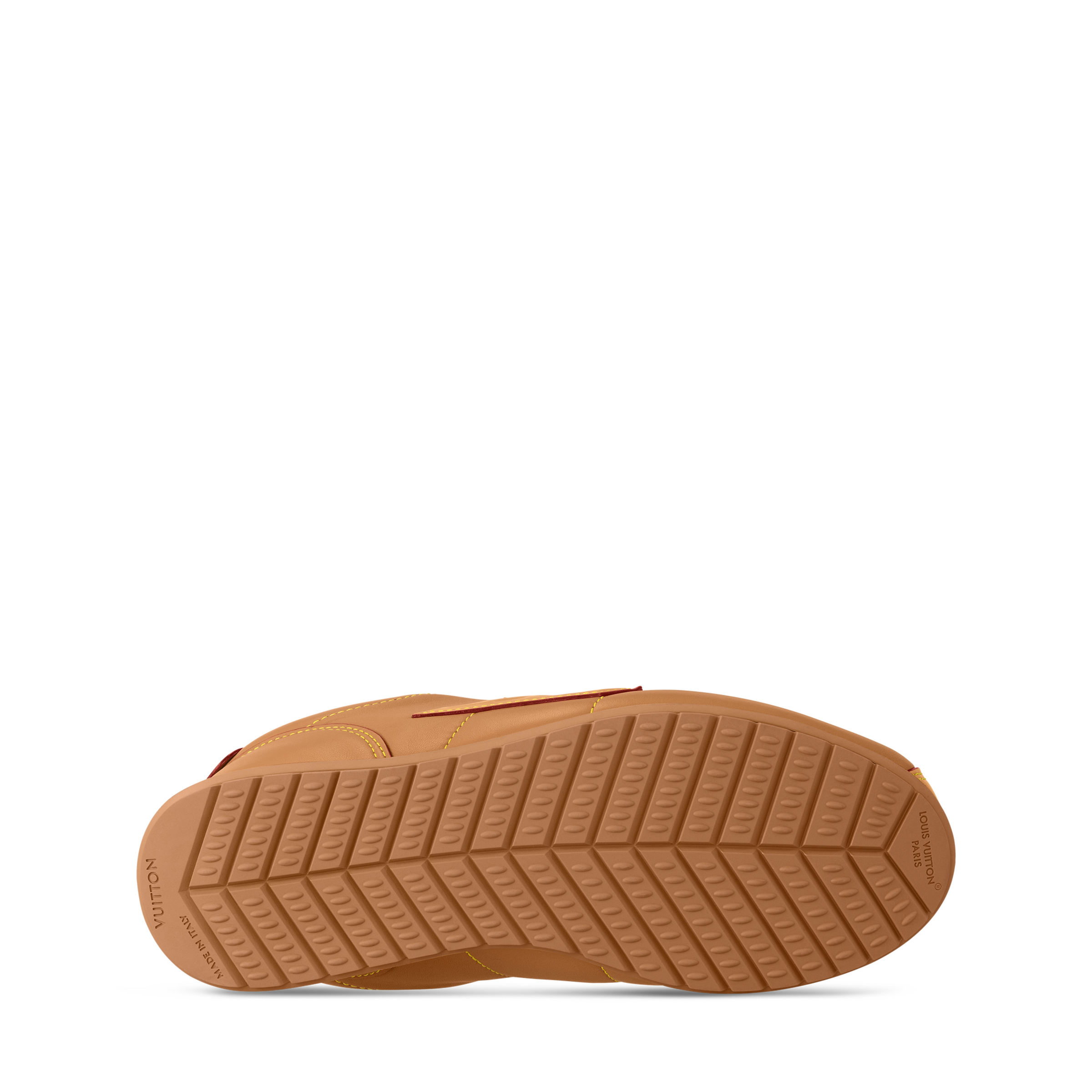 Tan rubber outsole with tread pattern and Louis Vuitton logo markings