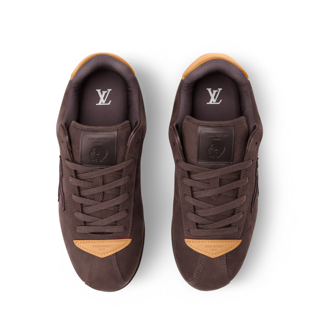 Pair of dark brown LV BUTTERSOFT sneakers, lace-up front with LV on tongue lining.