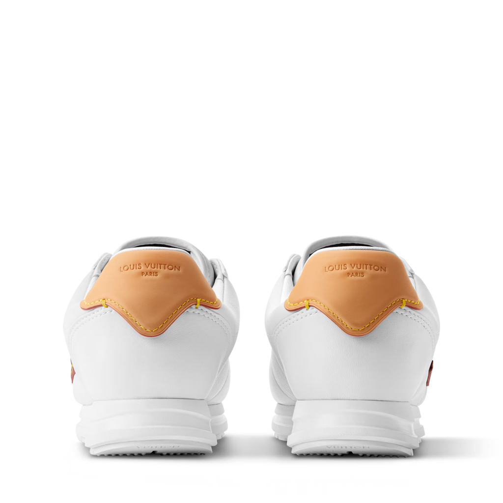 White LV Buttersoft sneakers, rear view with orange heel trim and Louis Vuitton branding