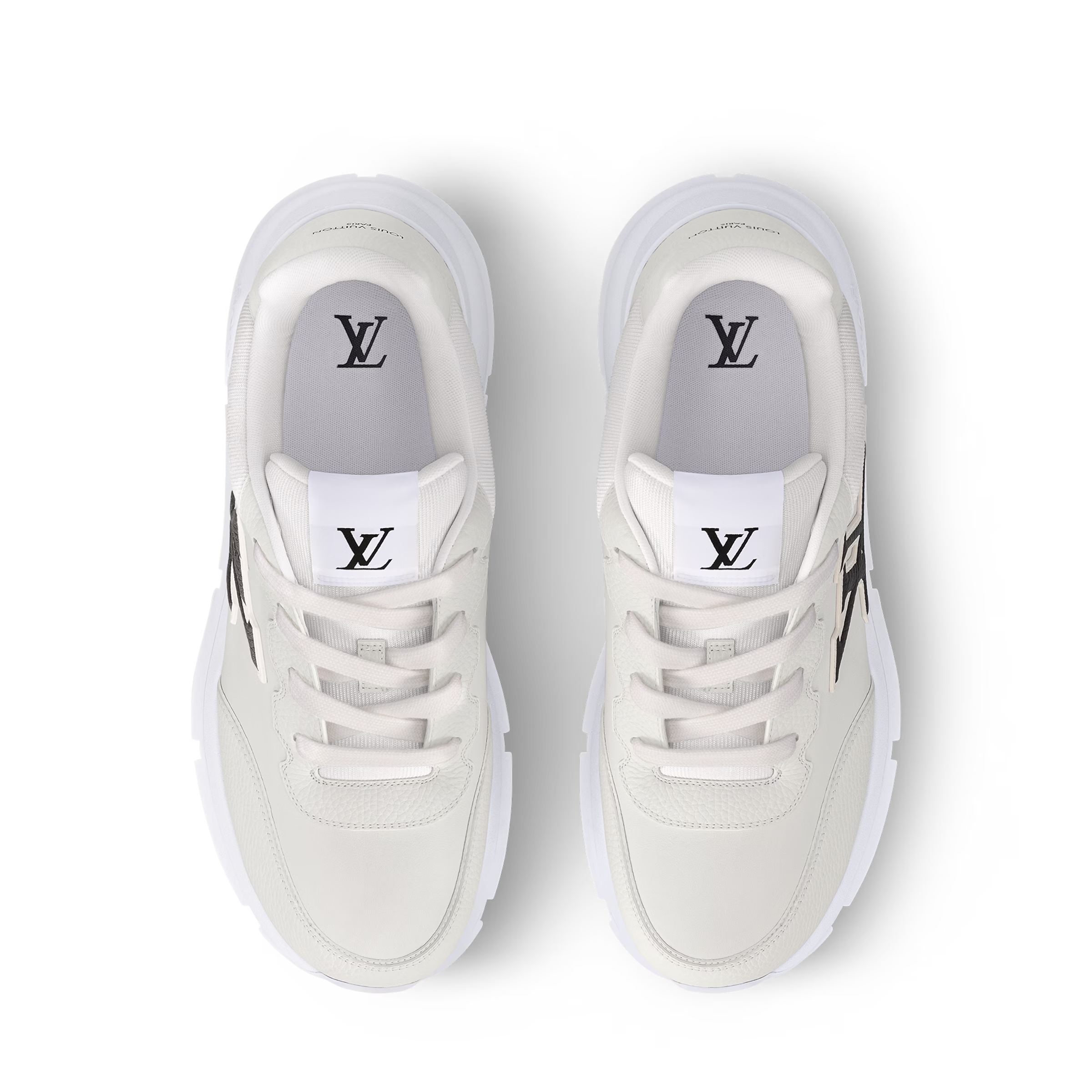 White trainers front view with lace eyelets and LV logo on tongue and interior