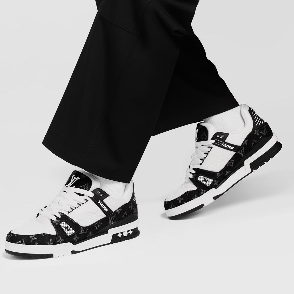 LV trainers worn with black pants and white socks, black-and-white sneaker profile