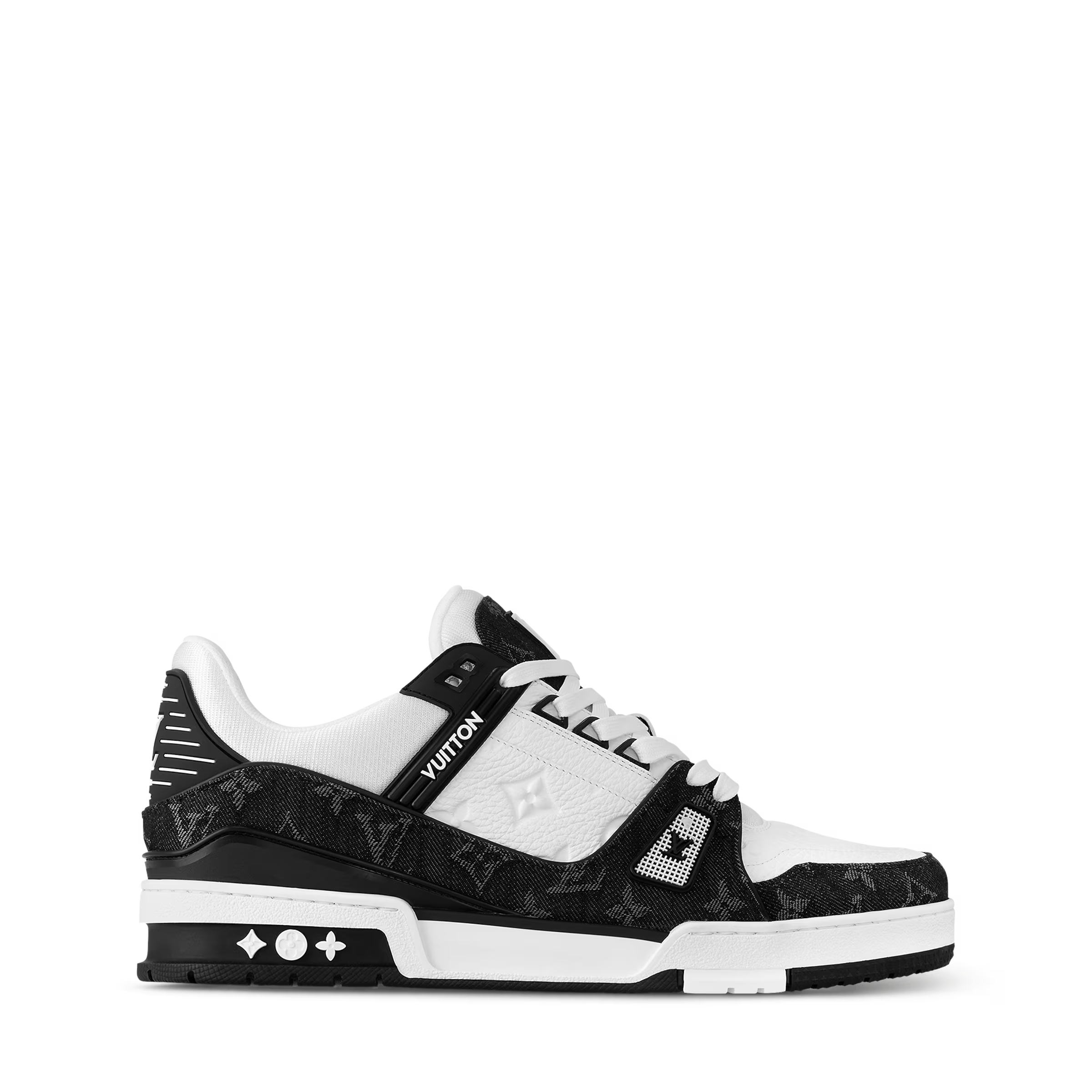 Side view of black and white LV trainers with signature LV detailing on upper