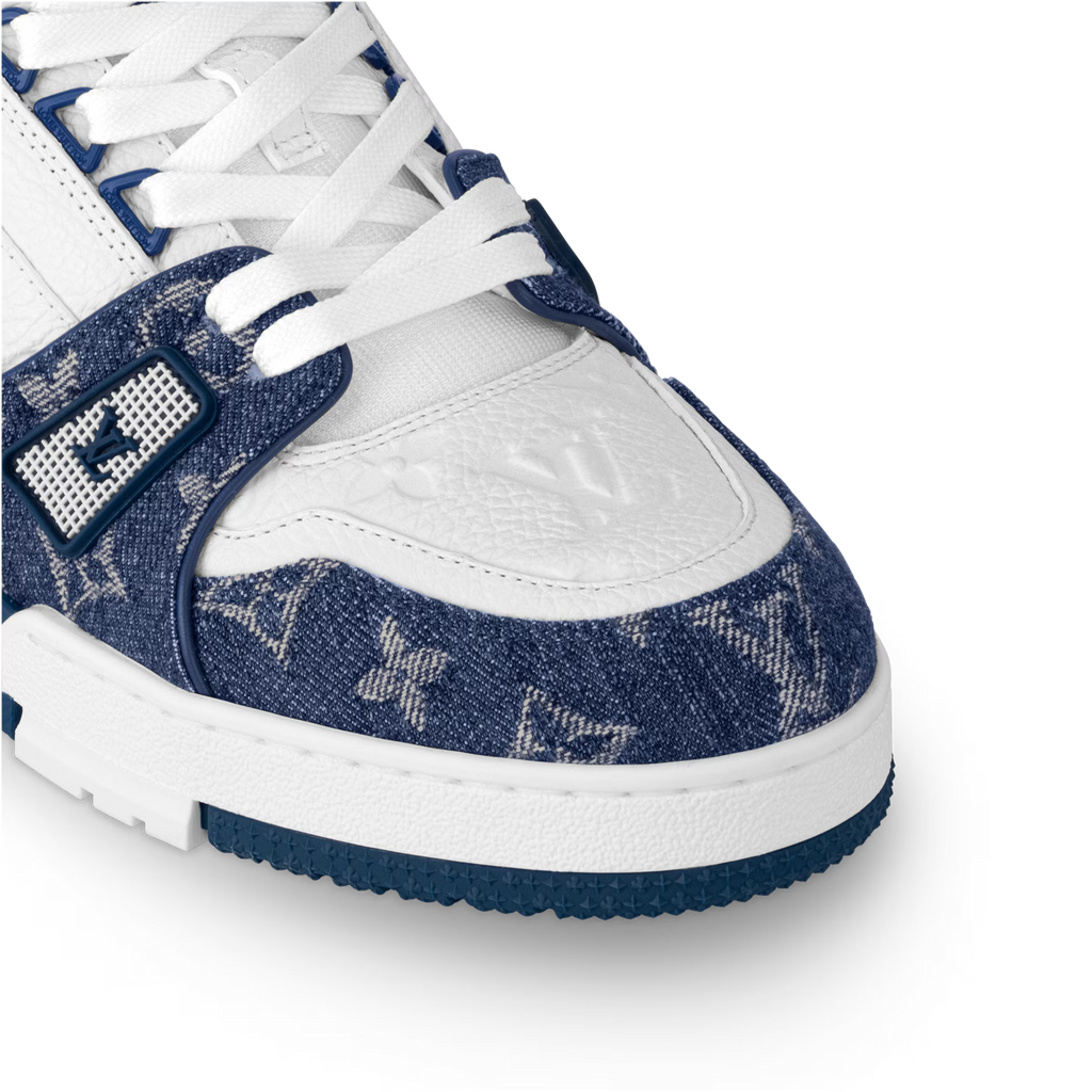 LV trainers with white laces and navy monogram side panel, leather toe cap.