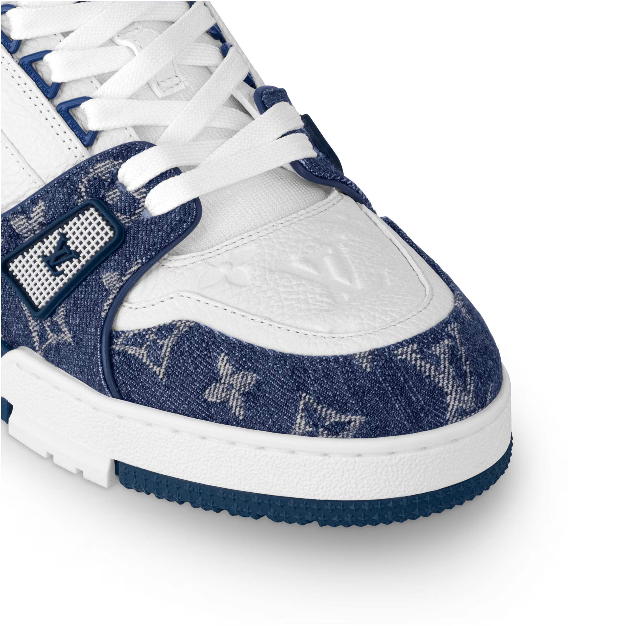 LV trainers with white laces and navy monogram side panel, leather toe cap.