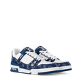 LV trainers with white leather panels, navy monogram canvas, and blue rubber sole.
