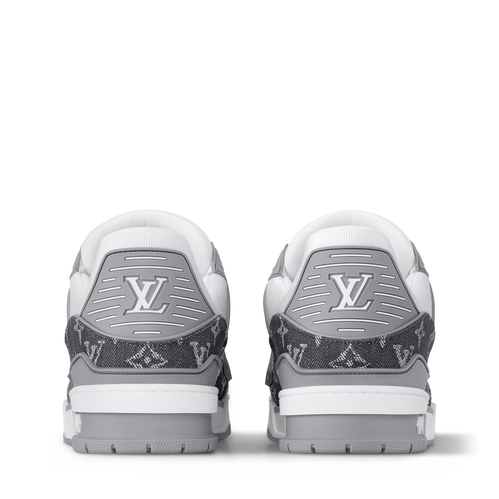 LV trainers heel view, dark monogram uppers, white midsoles, padded heel