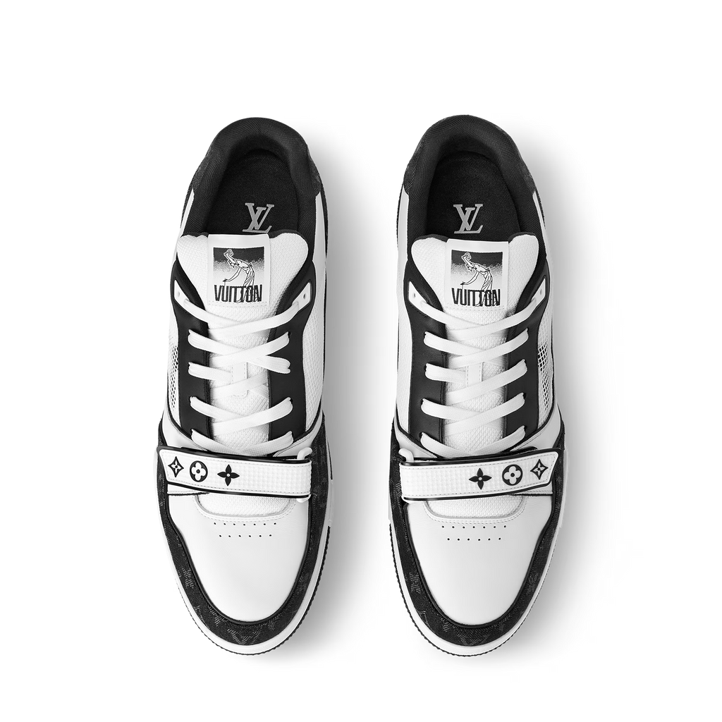 LV Trainer sneakers pair, white toe caps with black accents and logo belt details