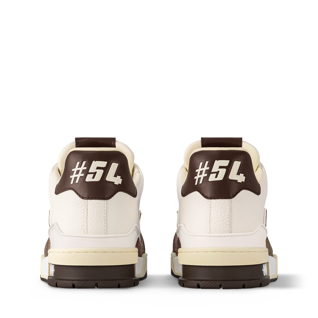 Cream sneakers with #5L heel tab and white laces, chunky sole and side stitching.