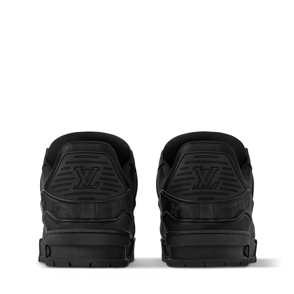 Black LV Trainer sneakers, back view with embossed LV heel logos and laces