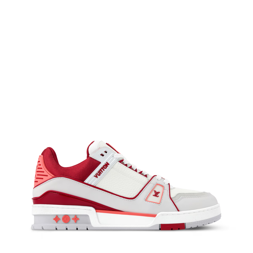 Side profile of white and red LV low-top sneakers with signature patch