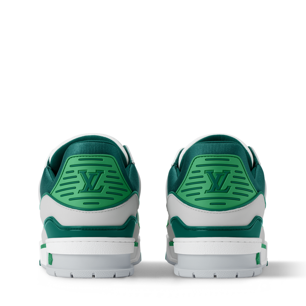 Back view of white and green low-top sneakers with heel branding