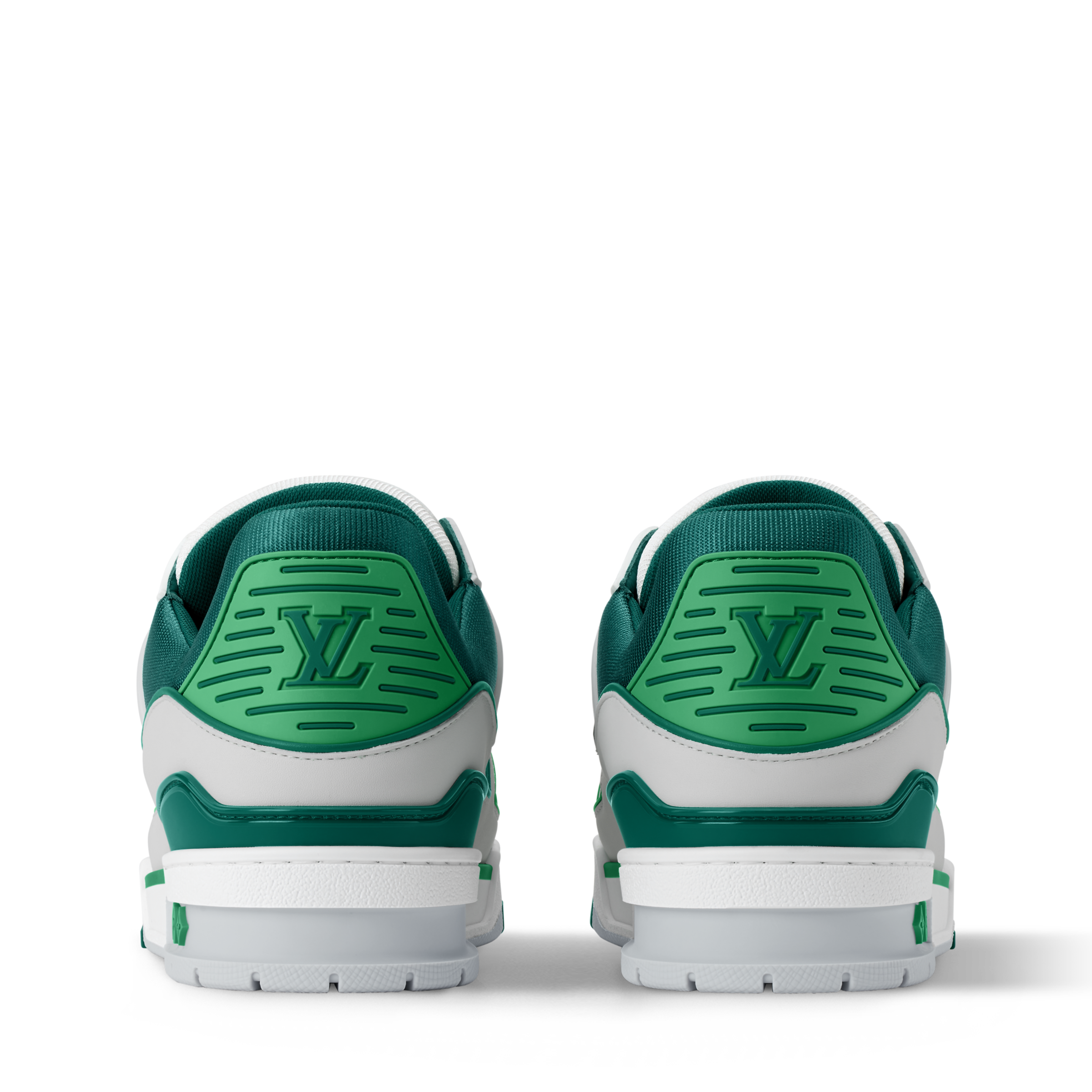 Back view of white and green low-top sneakers with heel branding