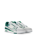 White and green low-top sneakers with lace-up front and side logo