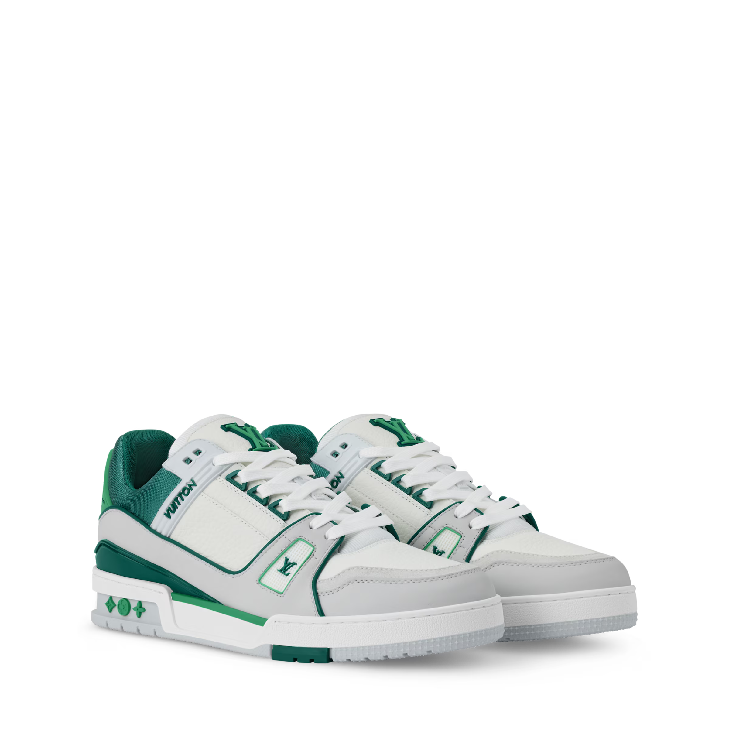 White and green low-top sneakers with lace-up front and side logo