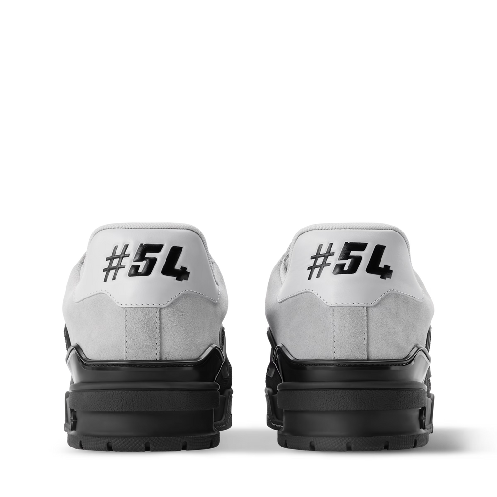 Back view of two-tone sneaker with #54 patch and chunky black heel sole