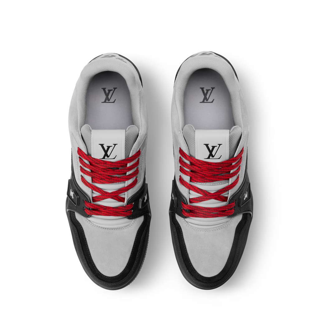 White-and-gray sneaker with red laces and LV logo on tongue and heel