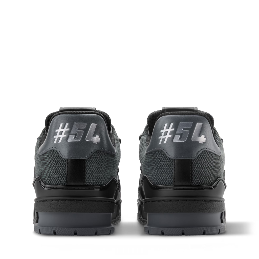 Black LV Trainer sneaker, rear view with #54 heel panel and padded collar.
