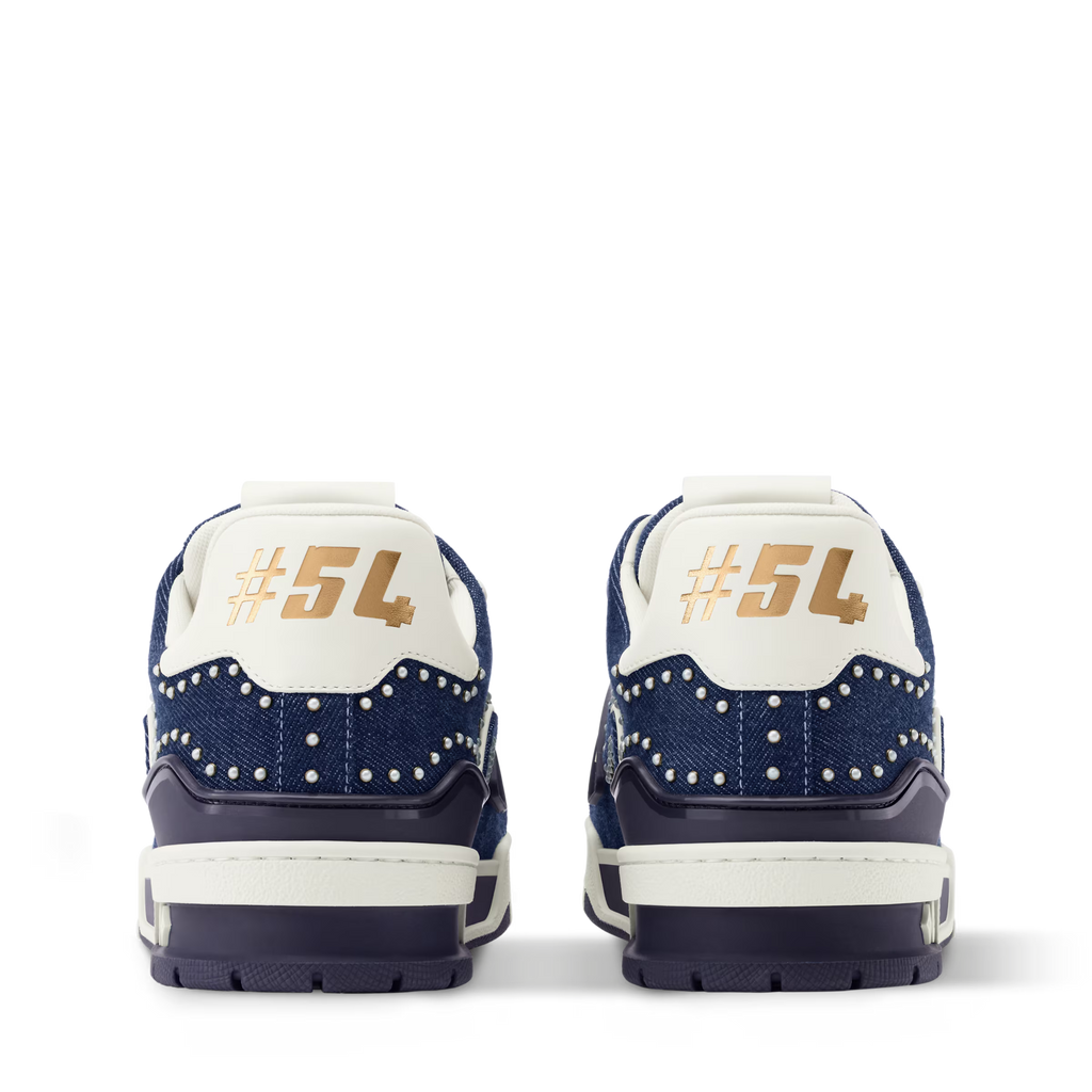 LV Trainer sneaker rear view, navy blue uppers with white heel patch and #SL print