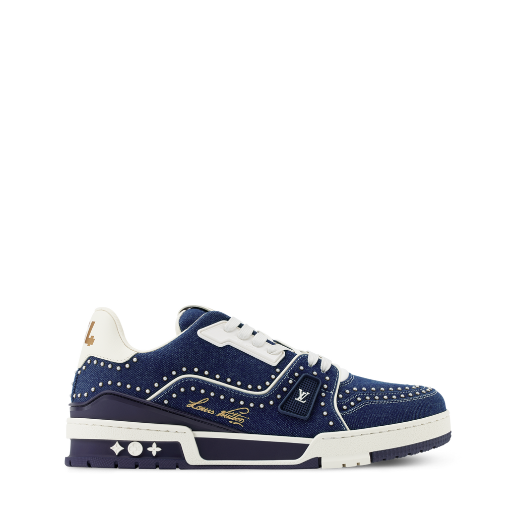 LV Trainer sneaker side view, navy blue with white trim and gold LV logo