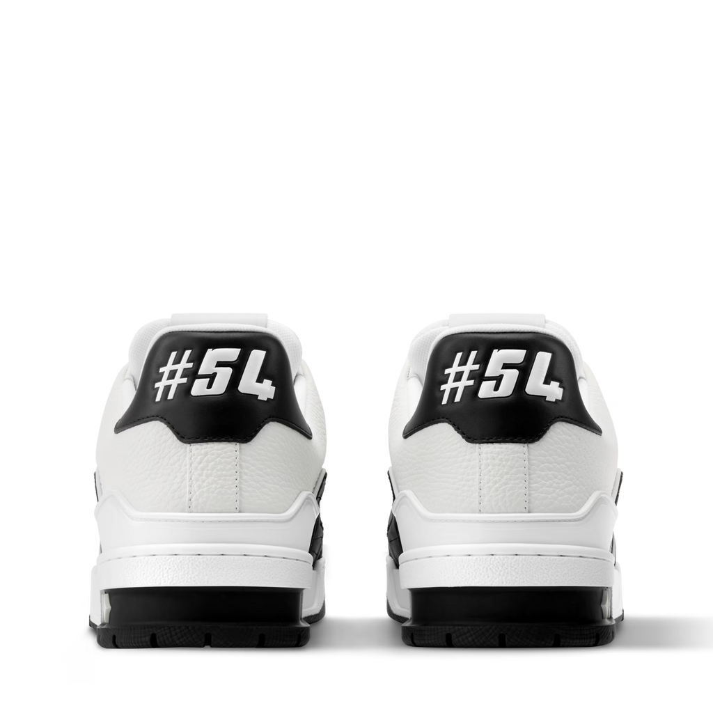 Black and white LV trainer sneakers, rear view with #54 heel panels