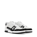 White and black LV trainer sneakers with lace-up front and side LV emblem